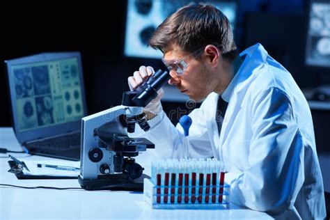 Scientist Working In Lab Doctor Making Microbiology Research Stock