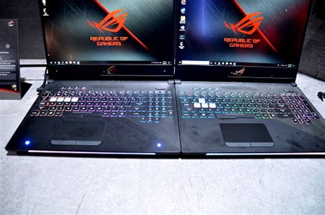 The layout takes a little bit of time to get used to because of the arrow key placement between the number. Two Gaming Laptops Reborn: ASUS ROG Strix GL504 SCAR II ...