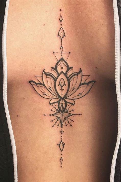 Sternum Lotus Flower Tattoo Under Breast