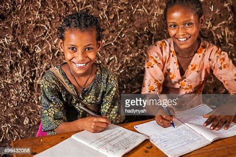 African Little Girls Are Learning Amharic Language High Res Stock Photo