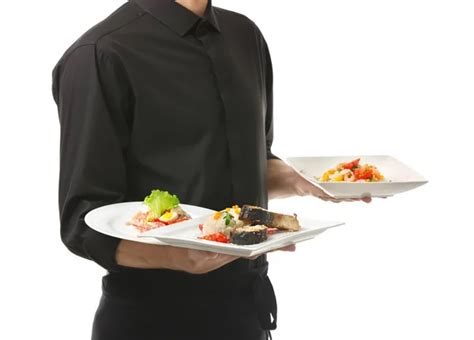 Waiter Holding Plates With Dishes — Stock Photo © Belchonock 184296816