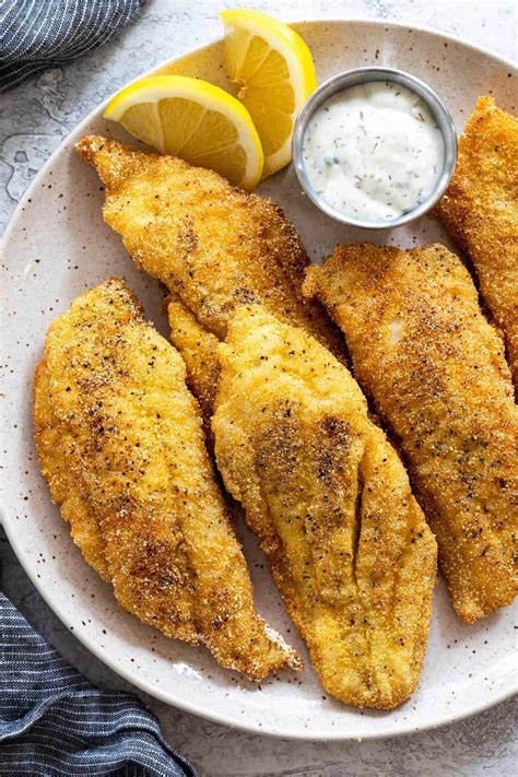 Fried catfish is an american deep south dish, coated in cornmeal and fried in oil or sometimes bacon grease. Fried Catfish - Varsha's Recipes