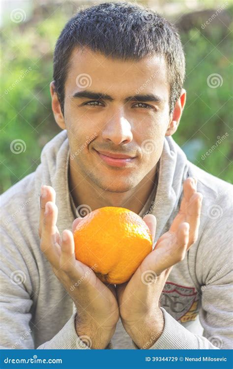 Man Holding An Orange Stock Image Image Of Portrait 39344729
