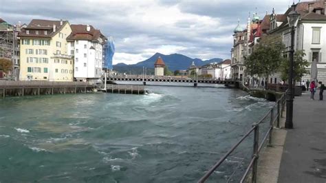 The Reuss River As It Passes Through Lucerne Switzerland Youtube