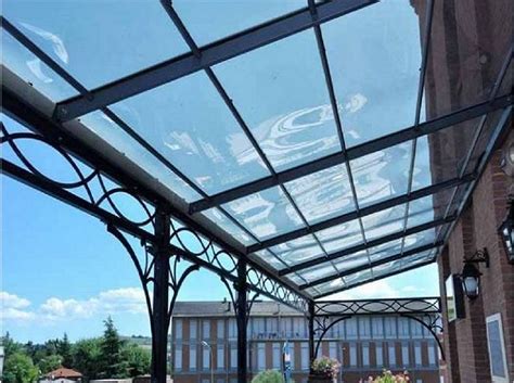 Consigli, marchi e prezzi delle coperture per terrazzi. Tettoie trasparenti per esterni in policarbonato e vetro