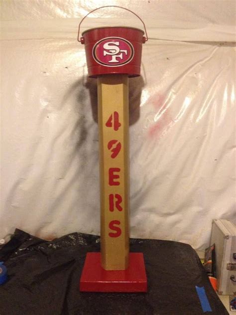 I saw this idea at the flea market and couldn't wait to try it out myself. SF 49ers outdoor standing ashtray available from http ...