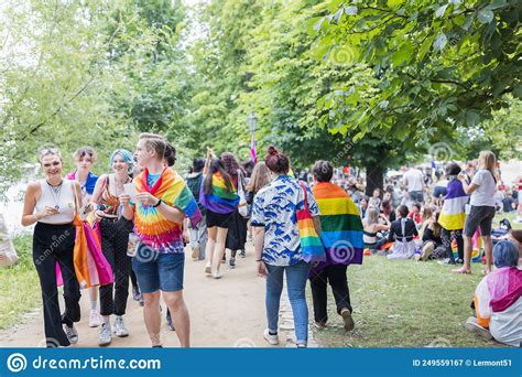 people with rainbow flags at the pride village on strelecky island at annual prague pride