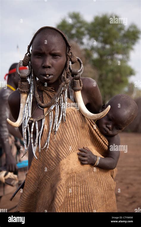 Mursi Mother And Baby Jinka Omo Valley Ethiopia Africa Stock Photo