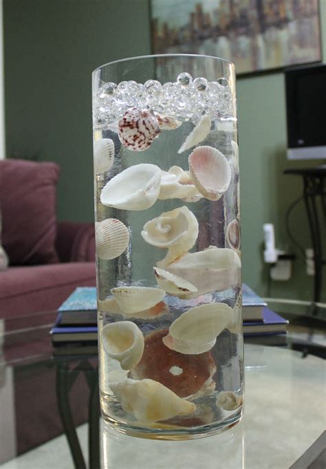 Seashells Suspended In Clear Water Beads Goldfish Centerpiece Water