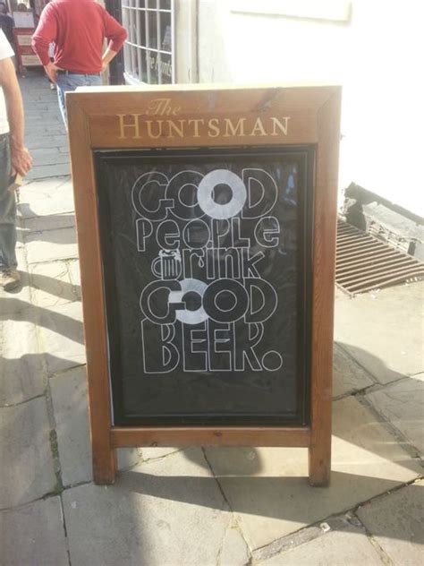 Retail Hell Underground Sidewalk Signage On Good Beer