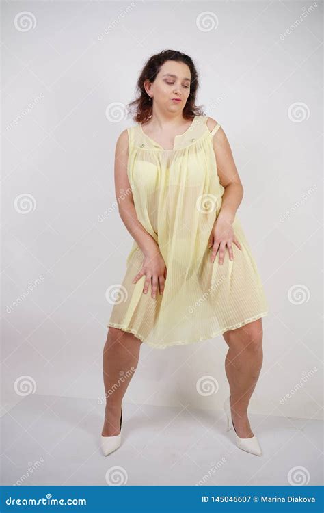 Pretty Chubby Girl Wearing Fashionable Yellow Underwear And Loves Her Body And Herself Plump