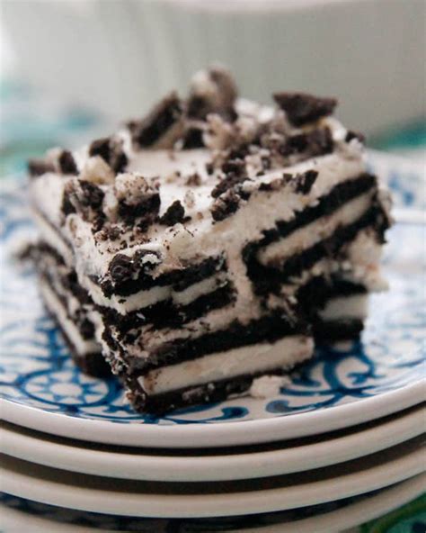 This oreo cake has two layers a rich, moist chocolate cake filled and covered in a light oreo whipped cream frosting! Oreo Icebox Cake - Chocolate Chocolate and More!