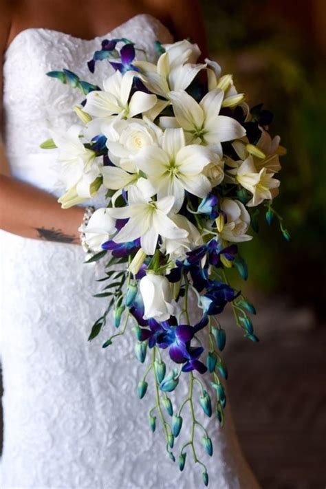 Cascading Bridal Bouquet With White Asiatic Lilies And Roses With An