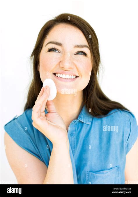 Woman Removing Make Up With Cotton Pad Stock Photo Alamy