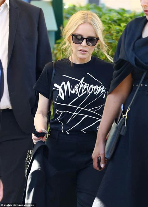 The collection features 25 glasses and five prescription sunglasses and launches in specsavers stores nationwide on valentine's day. Kylie Minogue is pictured leaving the funeral of legendary music icon Michael Gudinski - BroRead.com