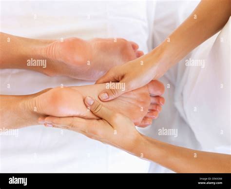 Hand Massaging Feet Stock Photo Alamy