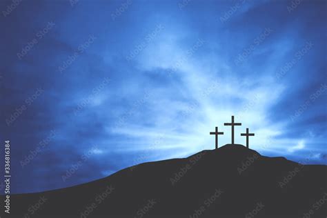 Three Christian Easter Crosses On Hill Of Calvary With Blue Clouds In