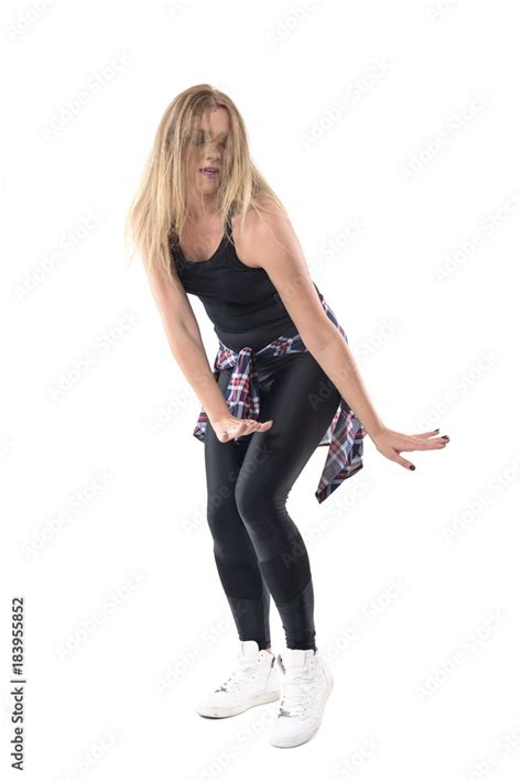 Passionate Blonde Woman Aerobics Instructor Dancing Jazz Dance With Tousled Hair Over Face Full