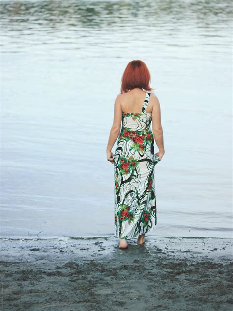 Back View Of A Young Woman Walking Into Water By Stocksy Contributor Jovana Rikalo Stocksy