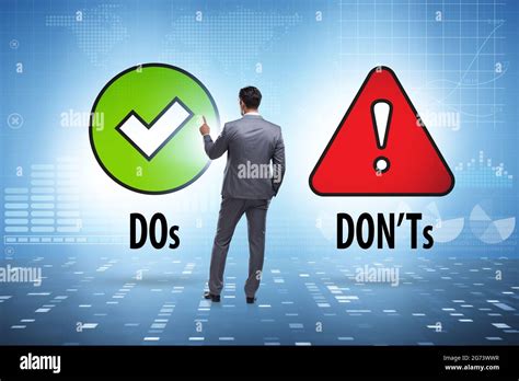Concept Of Choosing Between The Dos And Donts Stock Photo Alamy