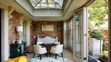 Interior View Of Orangery With French Doors Roof Lantern And Exposed
