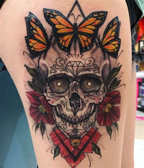 Sugar Skull Thigh Tattoo With Butterfly And Flowers Blurmark