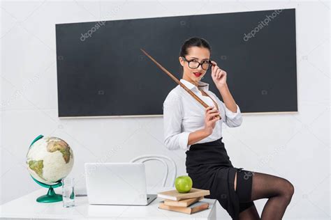 Young Sexy Teacher Stockings Pointer Sitting Desk Front Free Download