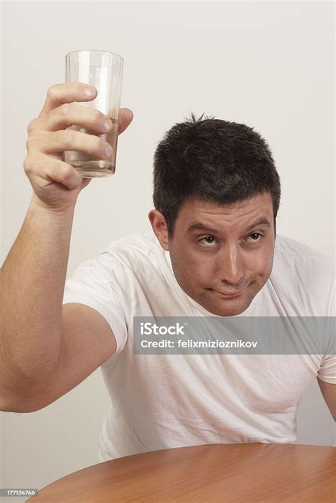 Drunk Man Holding Up His Glass Stock Photo Download Image Now Adult