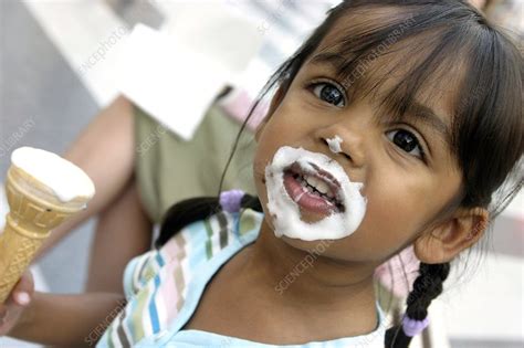 Young Girl Eating An Ice Cream Stock Image C0067439 Science