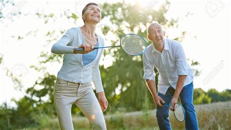 Badminton 36835888 Senior Couple Playing Badminton In Summer In Nature