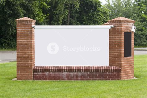 A Blank Sign With Brick Pillars Found In A Suburban Town Royalty Free