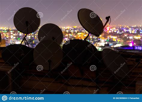 Dish Antennas And City Lights In Background Stock Photo Image Of Dish