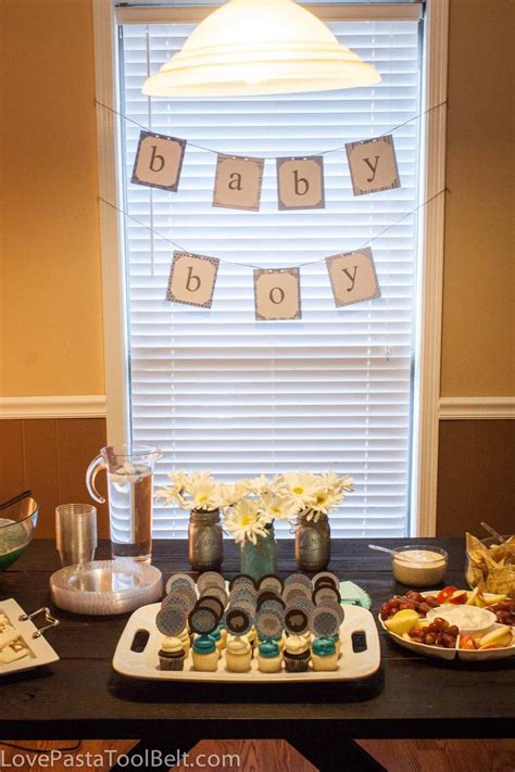 April showers bring may flowers. Blue and Gray Baby Boy Shower - Love, Pasta, and a Tool Belt