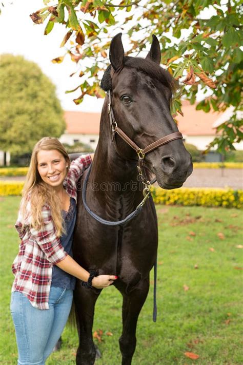 Young Beautiful Woman With A Horse Stock Photo Image Of Paddock Farm