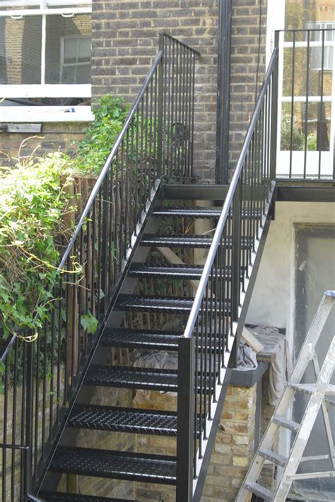 Crossed stairs, parallel to the façade; Steel Staircase London - Hammersmith - Arc Fabrications
