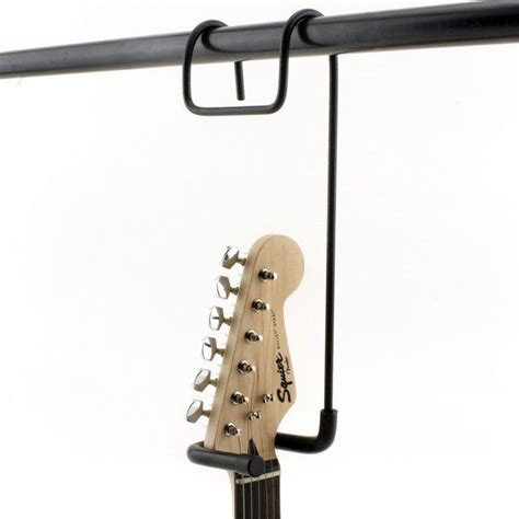 This is yet another guitar hanger. Fancy - Closet Guitar Hanger | Guitar hanger, Closet ...