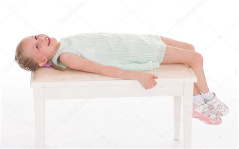 Portrait Of A Little Girl Lying Stock Photo By ©lotosfoto1 44490171