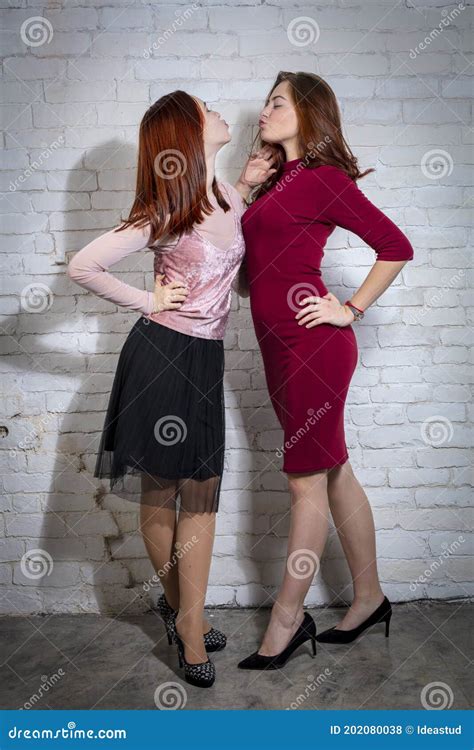 teen girl kissing older woman telegraph