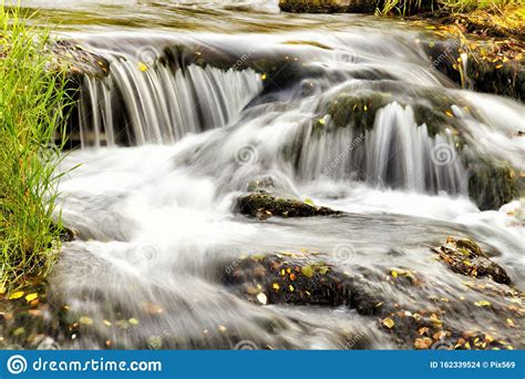 Rushing Water Over Rocks In A Mountain Stream Stock Photo Image Of