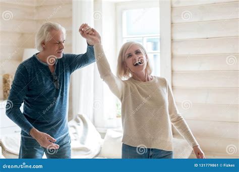 Happy Aged Husband And Wife Dancing At Home Stock Image Image Of Husband Pensioners 131779861