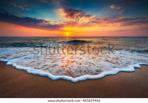 Beautiful Cloudscape Over Sea Sunrise Shot Stock Photo