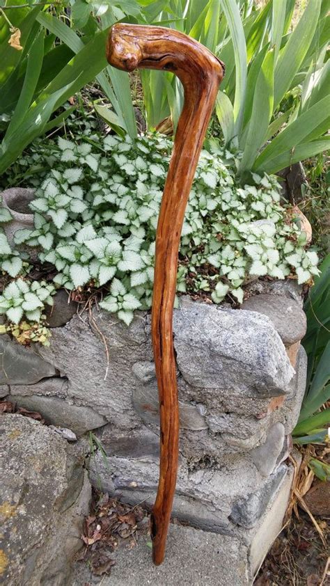 This Rustic Walking Stick Was Made From A Naturally Curved Piece Of