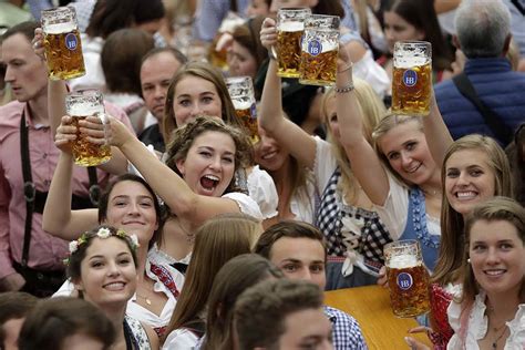 millions of people millions of liters of suds flow at oktoberfest nation and world news