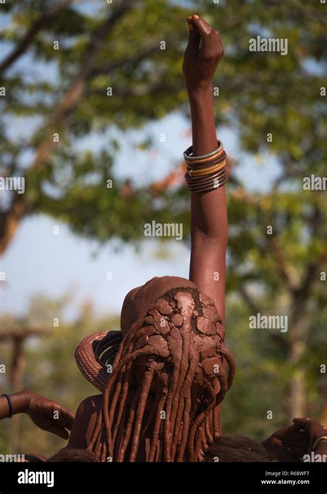 Himba Tribe Young Woman Looking At A Drone In The Sky Cunene Province