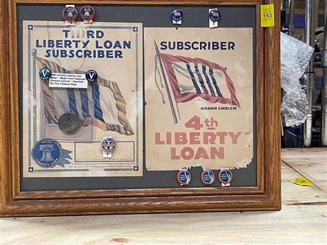 Lot - Liberty Loan advertisements and pins plaque