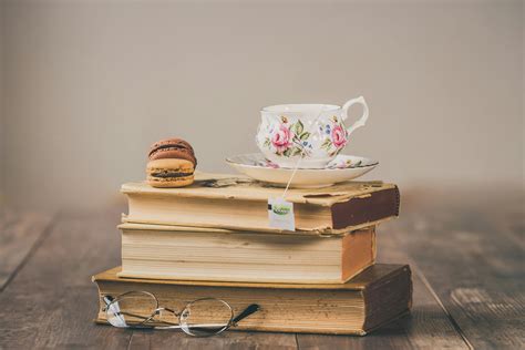 Photo Of Teacup On Top Of Books · Free Stock Photo