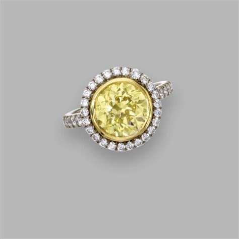 103 Fancy Intense Yellow Diamond Ring