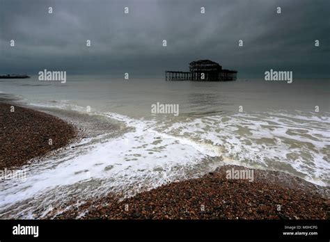 Dramatic Skies Over The Ruined West Pier Brighton And Hove East Sussex