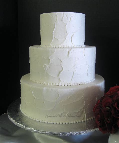 Simple Elegant Textured Buttercream Wedding Cake A Photo On Flickriver