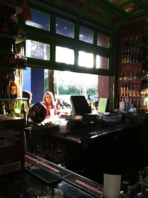 Serving broward, palm beach & martin county. Inside/outside bar with garage door concept - it works ...